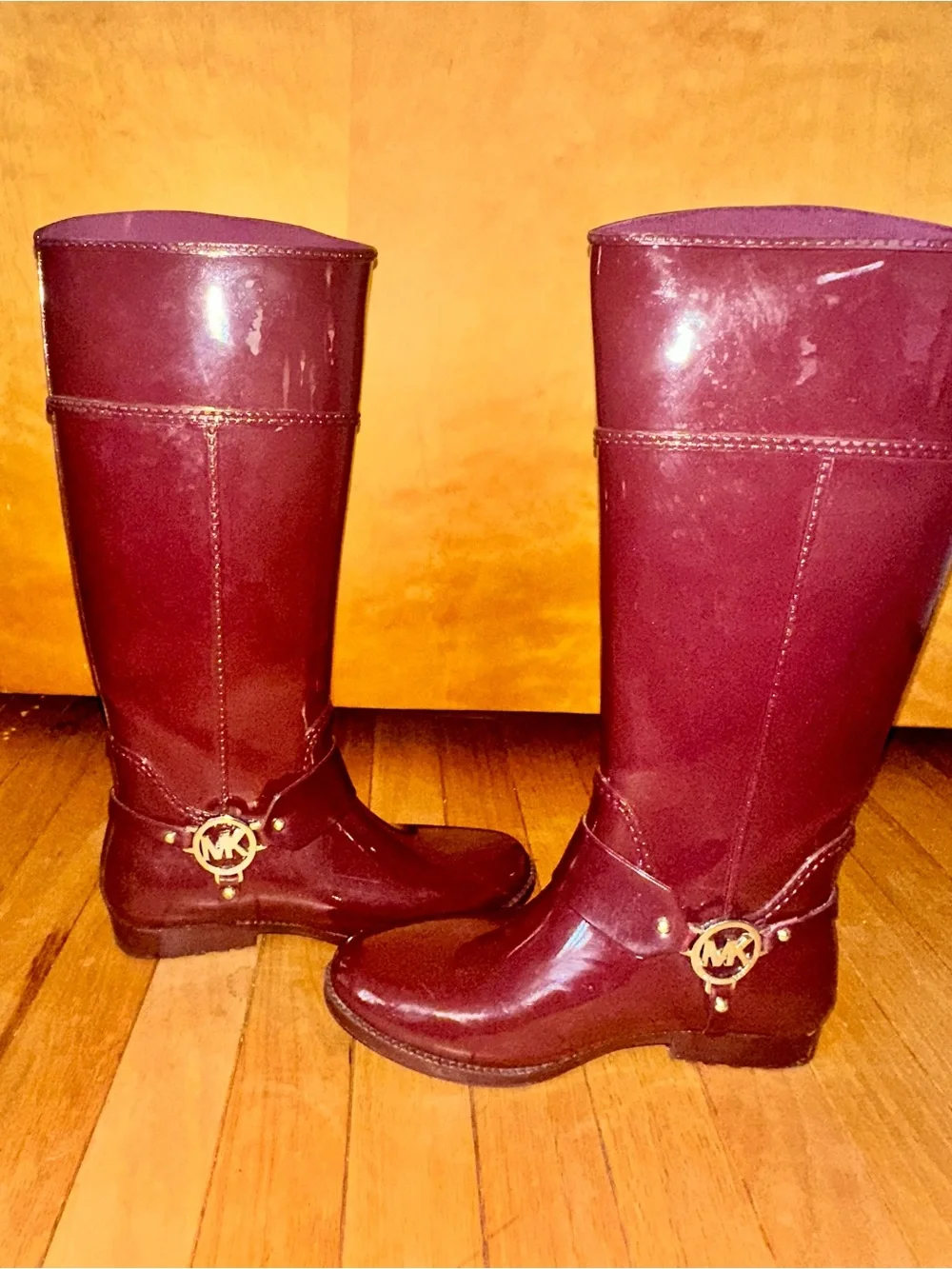 Michael Kors Glossy Burgundy Knee-High Rain Boots with Gold MK Accent